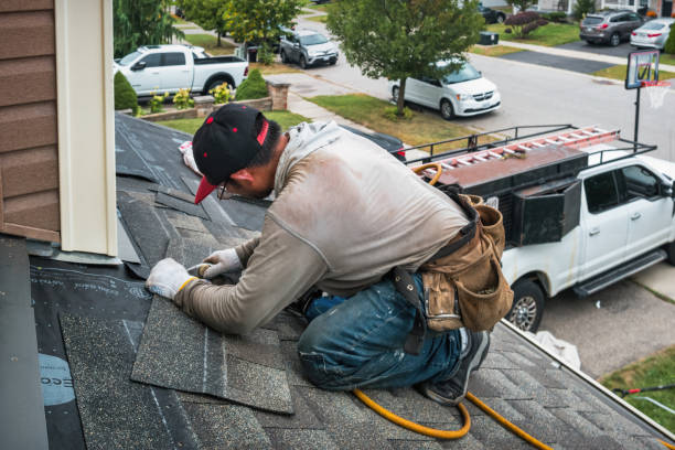 Professional Roofing technician working in North Falmouth, MA